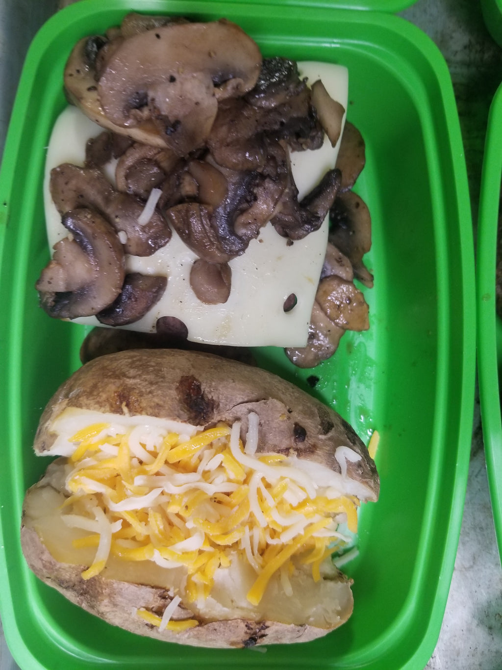 burger with cheese and mushrooms with a baked potato  best meal delivery