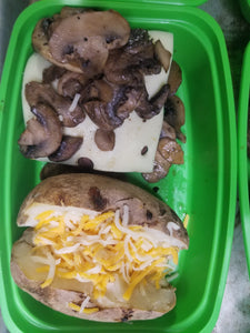 burger with cheese and mushrooms with a baked potato  best meal delivery